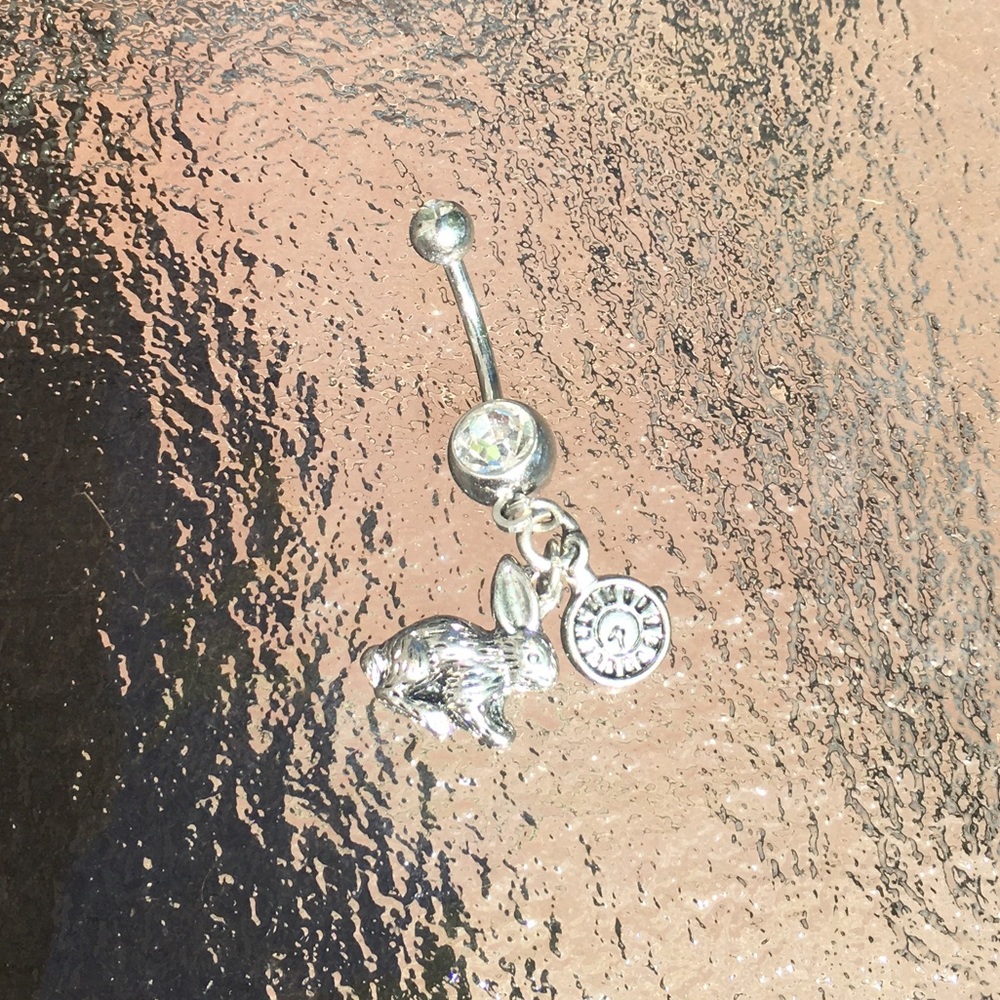 Alice in wonderland belly button ring
